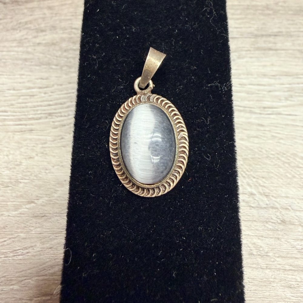 Elegant Gold Tone Pendant with‎ White Stone